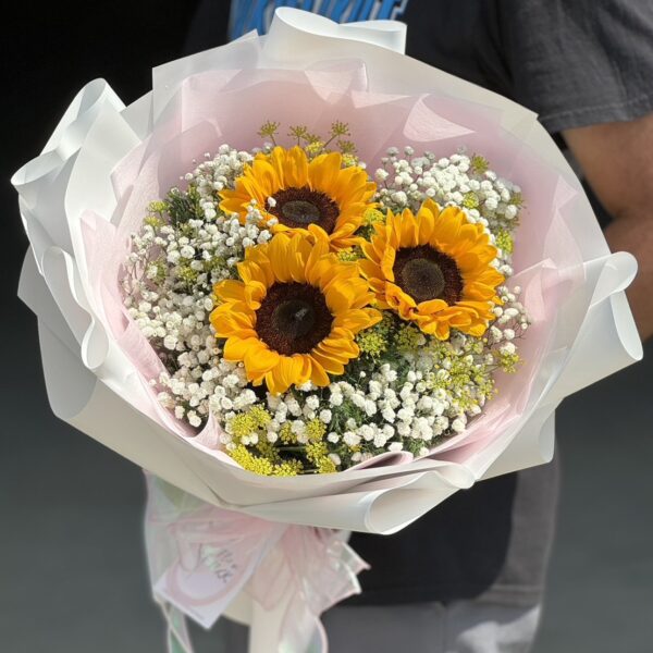 stunning Sunflowers Wrapped in Pink Paper