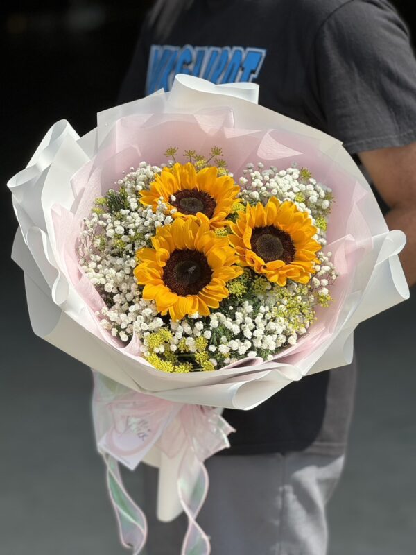 stunning Sunflowers Wrapped in Pink Paper